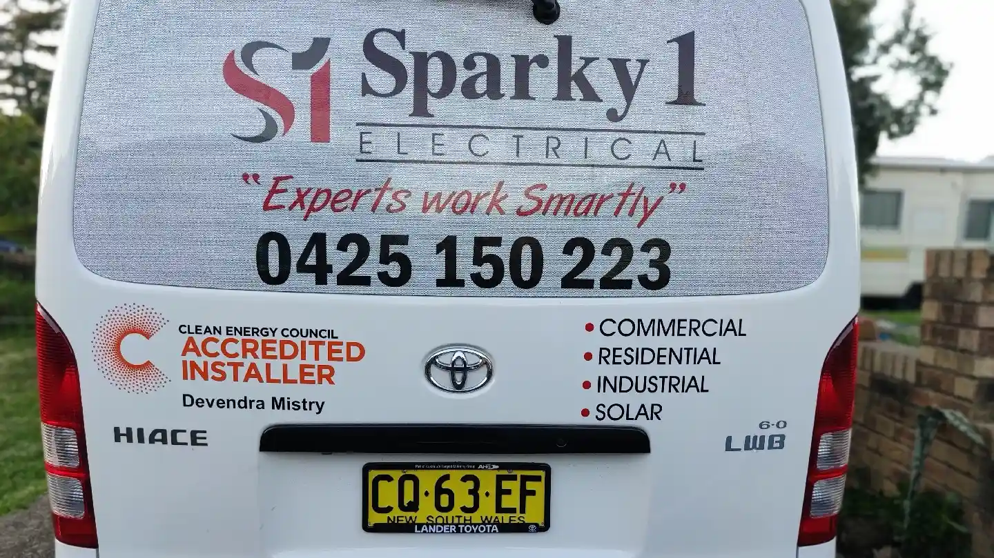 Rear of the Sparky 1 Electrical van showing its services and phone number
